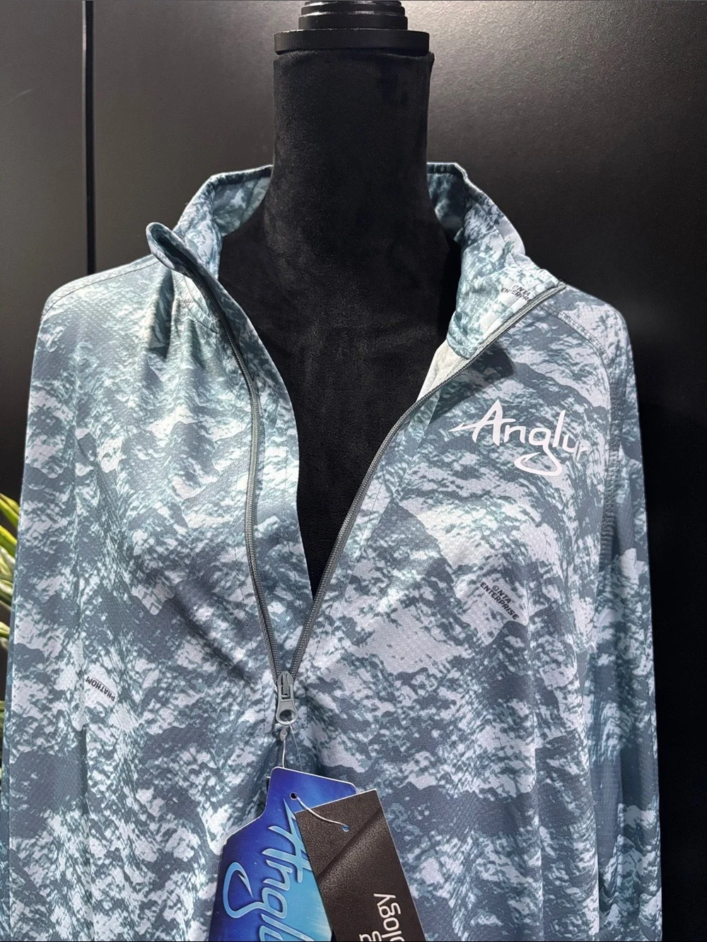 Anglur Phathom UPF treated Sun Protect,1/4 zip moisture wick,logo chest,fishing